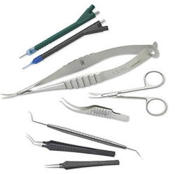 A set of precision surgical instruments arranged on a white background, including fine forceps, spring-handled scissors, needle holders, and cannulas with green and blue tubing. The instruments are the delicate, small-scale tools used in microsurgery such as ophthalmic procedures.